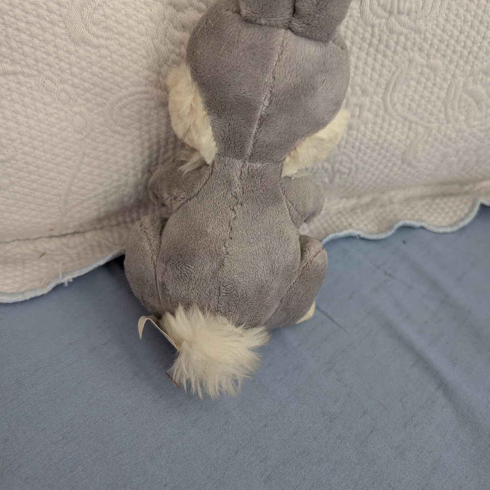 Four medium sized Thumper stuffed animals and three small Thumper stuffed animal